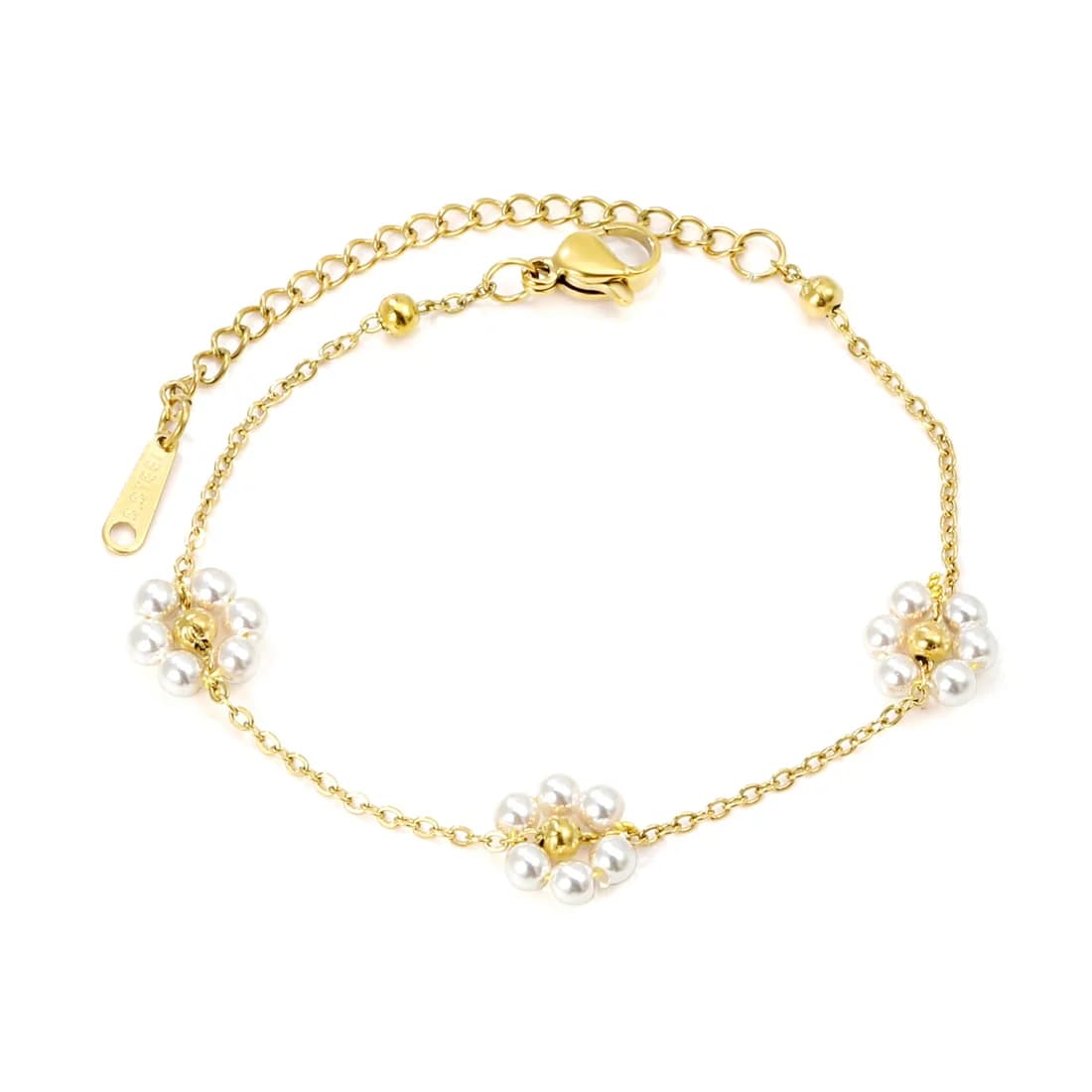 Guldfärgat armband med pärlblommor
